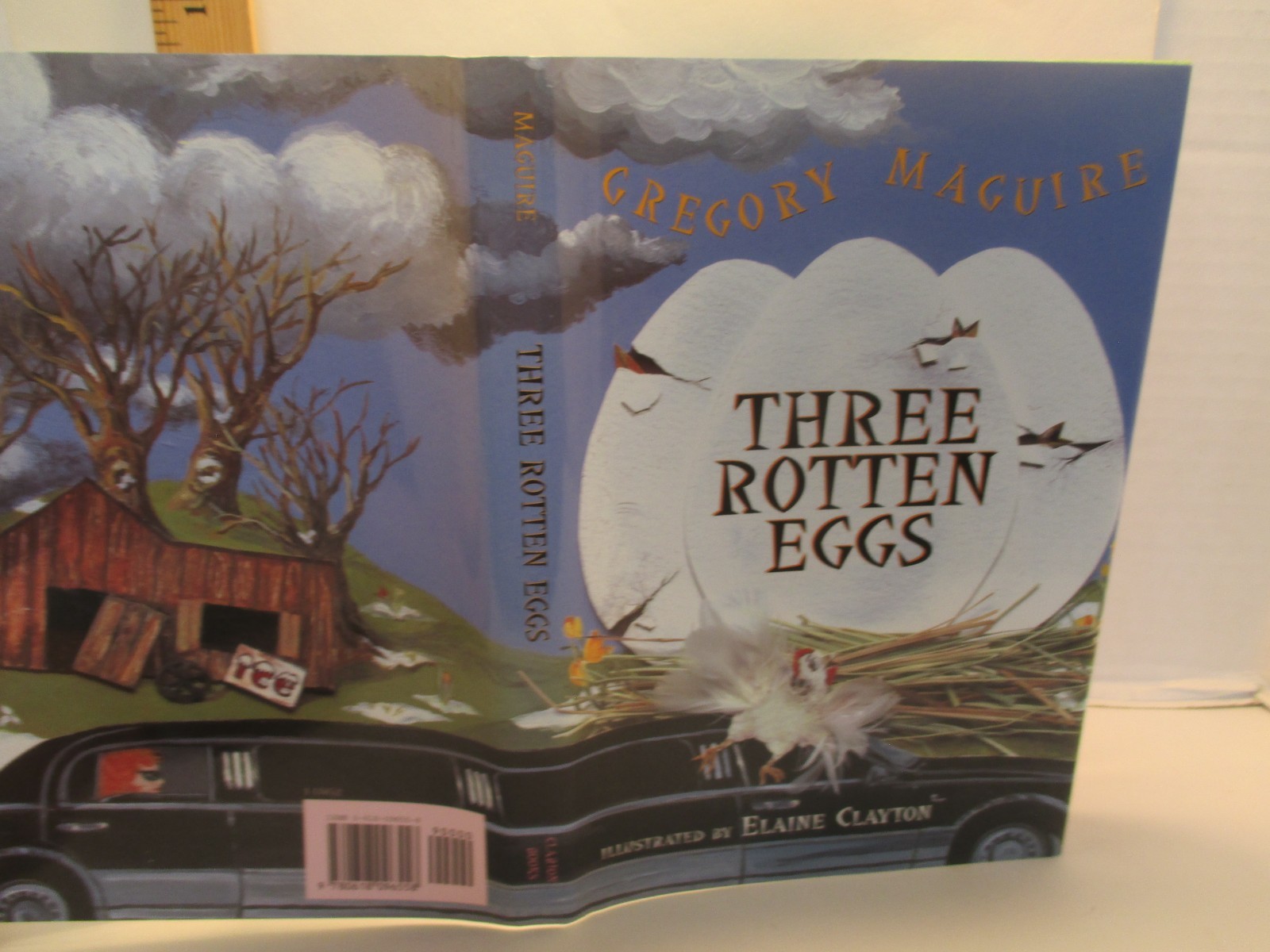 THREE ROTTEN EGGS by GREGORY MAGUIRE illus CLAYTON 2002 hc + dj 1st ed