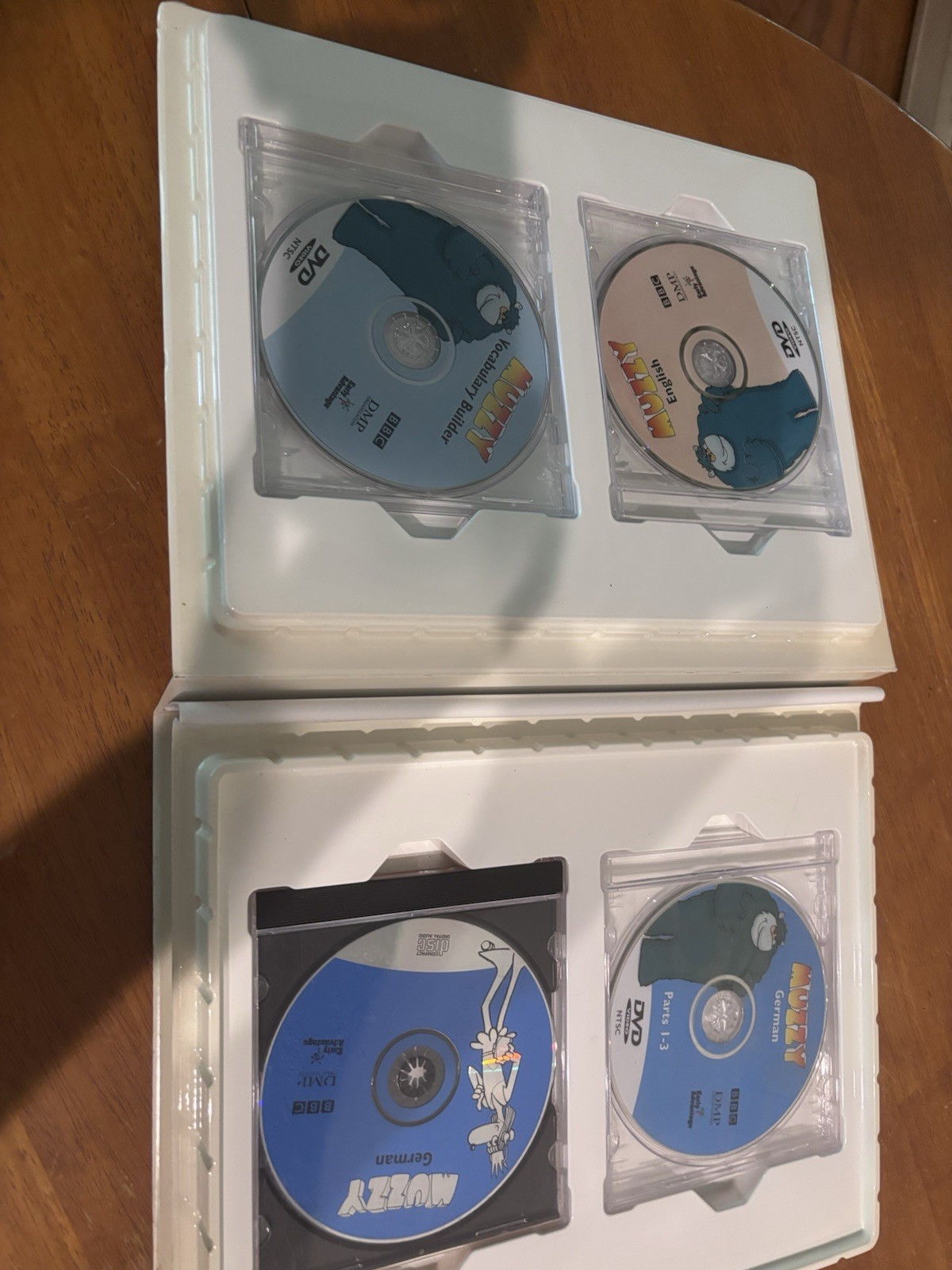 Learn German Bundle Muzzy/Findet Nemo Monsters Inc/3DVDs/books/Small DVD Player